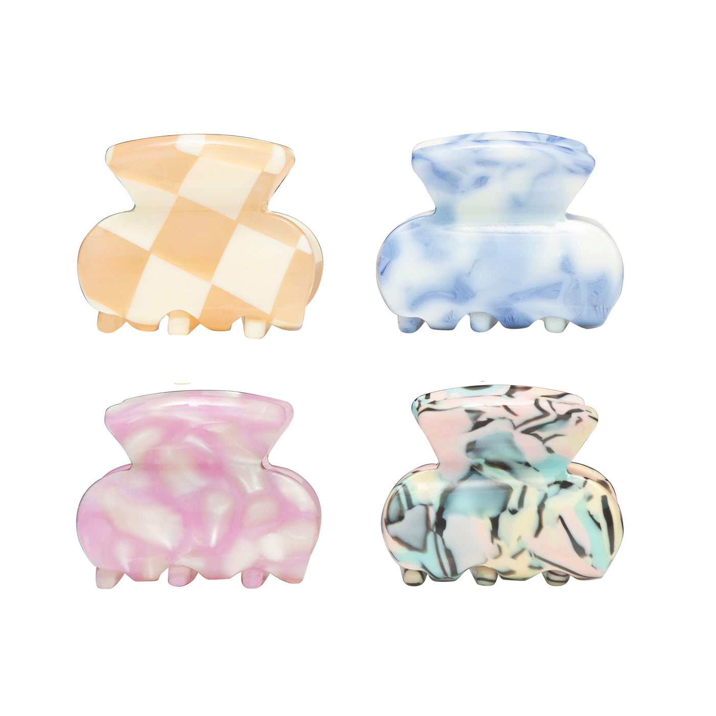 Four colourful mini bulldog clips in cheerful patterns