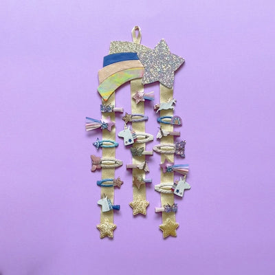 Image of star wall hanger displaying hair clips