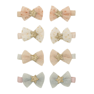 Mini glitter flecked tulle tutu bow clips in blush pink, white and blue with glittery gold stars 