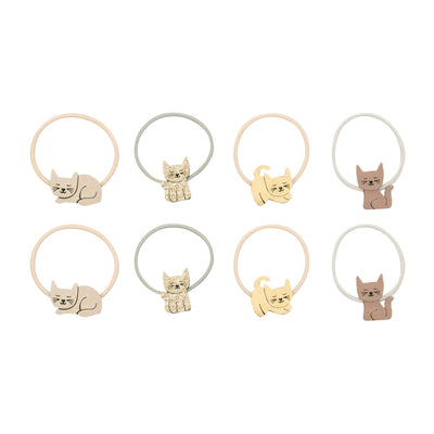 An assortment of kitty cat ponies- beige, glittery gold, pink, and gold