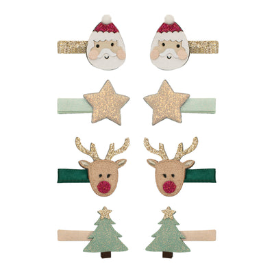 Santa and Rudolph mini clips with gold santa clip, glittery gold star clip, green rudolph clip, and a blush christmas tree clip with green christmas tree