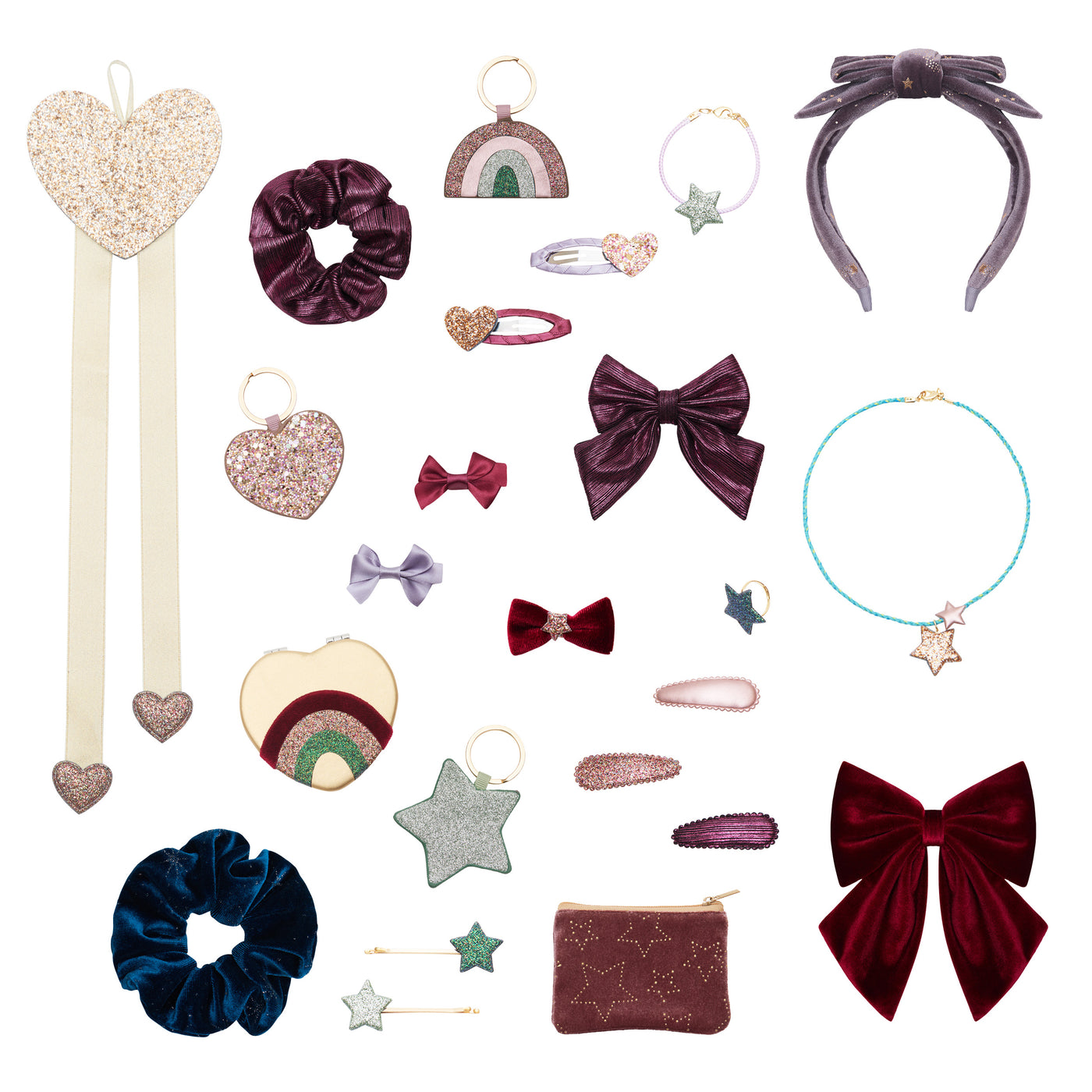 Contents of the Selfridges x Mimi and Lula advent calendar- gold glitter heart wall hanger- deep blue velvet scrunchie-gold mini mirror -purple fabric scrunchie with matching bow-rainbow, heart and star glittery key rings- Burgundy coin purse with gold star rhinestones- velvet red berry bow -velvet purple head band with foil star pattern- two velvet mini clips in red and purple- two sparkly clic clacs with glittery gold hearts- velvet bow hair clip with gold star- set of three clic clacs- star jewellery set