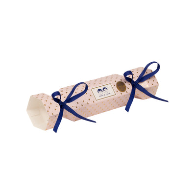 Blush pink christmas cracker- gold christmas print featuring blue ribbons