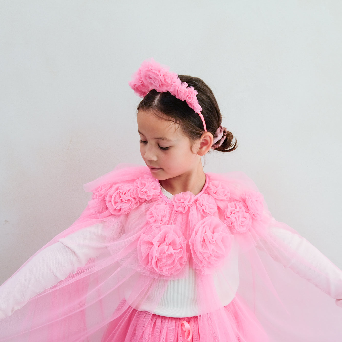 Pink ruffle flower cape