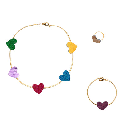Three piece sparkling heart themed children's jewellery set including a necklace, ring and bracelet