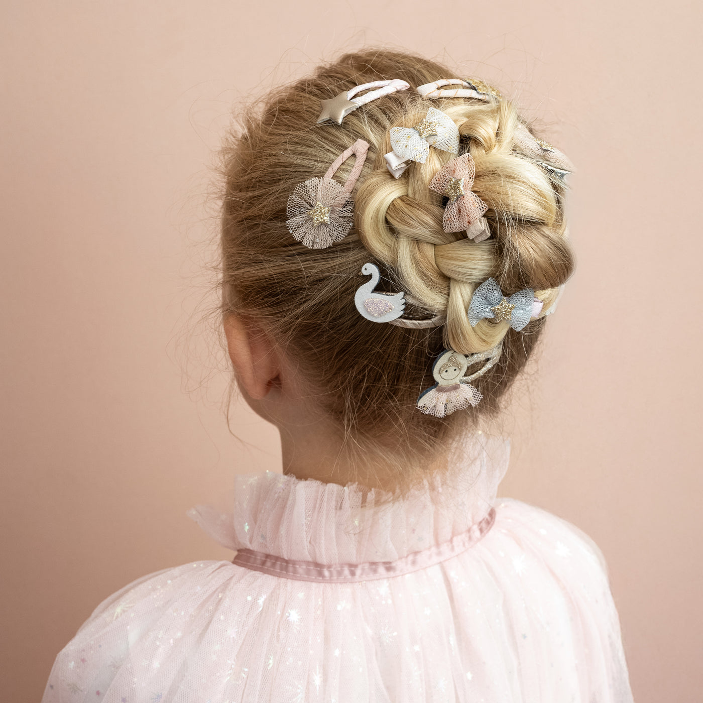 ballerina mini clic clacs bring a sprinkle of glittery magic with charming swan, star, and cloud designs.