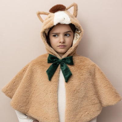 Little girl wearing fluffy horse cape with hood featuring a fluffy brown mane and tail- Cute stitched horse face- sateen and fur lined- Deep green velvet bow closure