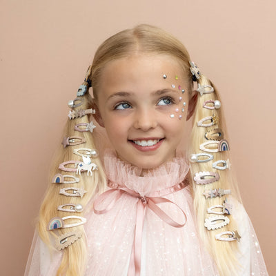 A super sweet unicorn, rainbow and stars come together in the prettiest palette of pastels for a look they'll love!