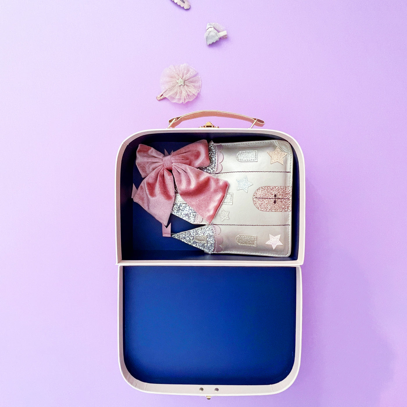 pink mimi & lula gifting suitcase filled with accessories