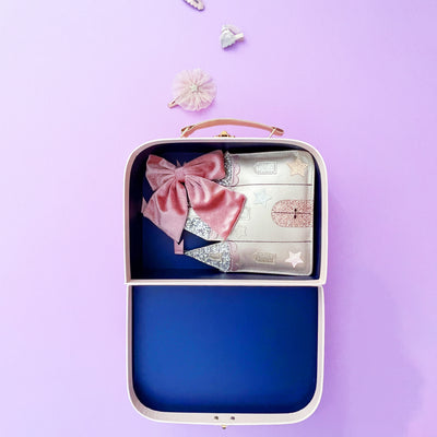 pink mimi & lula gifting suitcase filled with accessories