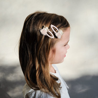 girl wearing fairy clip set in hair