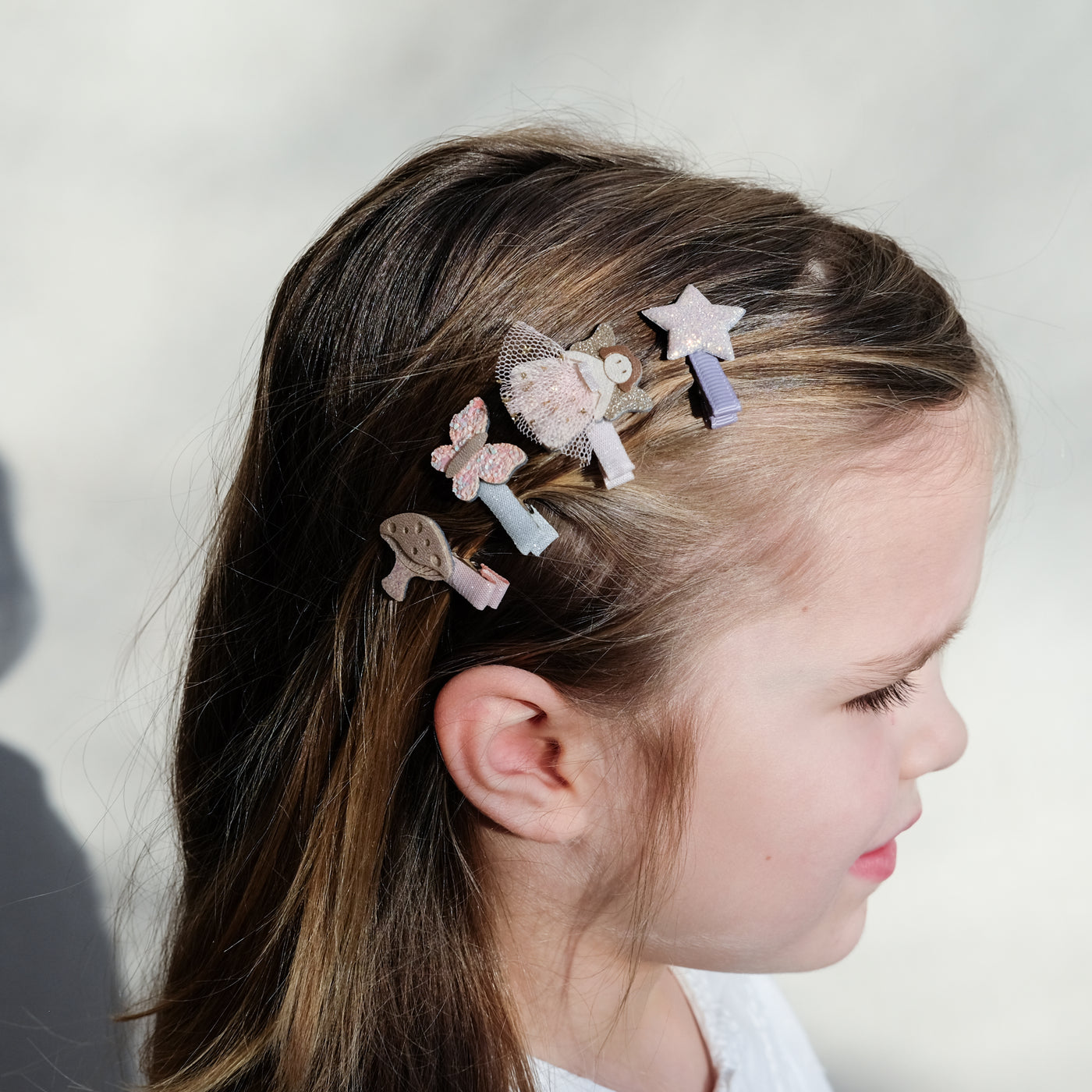 girl wearing fairy mini clips in her hair