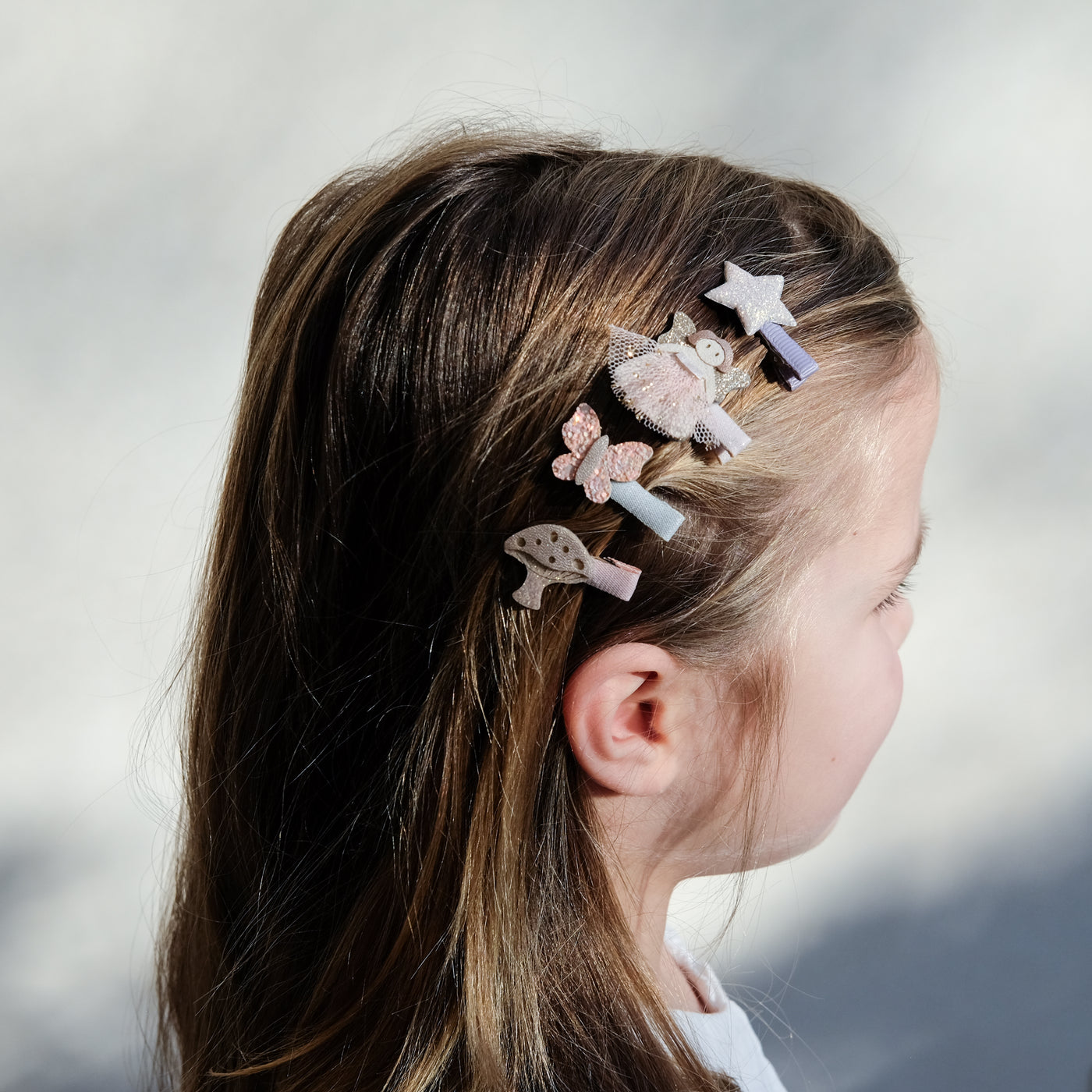 girl wearing fairy mini clips in her hair