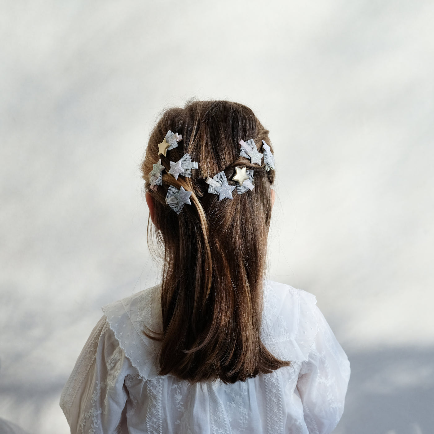 girl wearing ballet star mini clips in hair