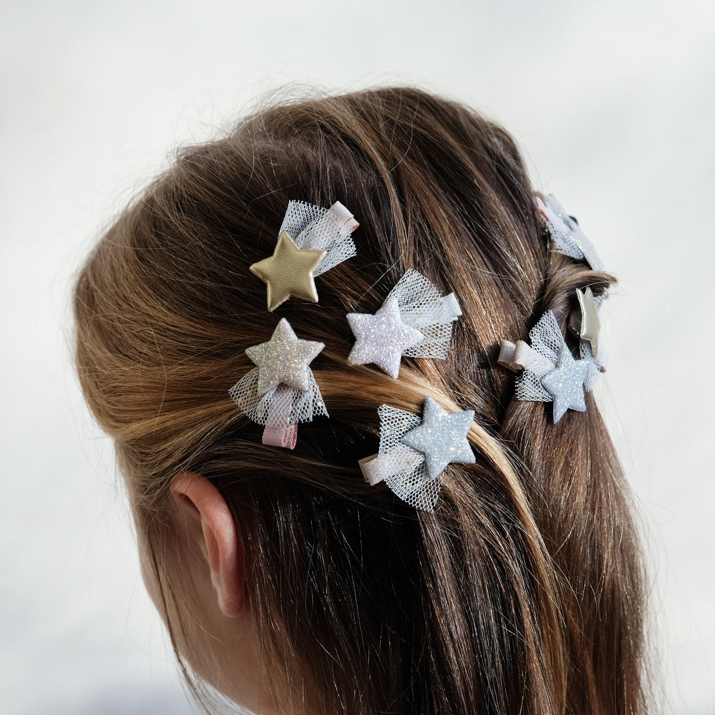 girl wearing ballet star mini clips in hair