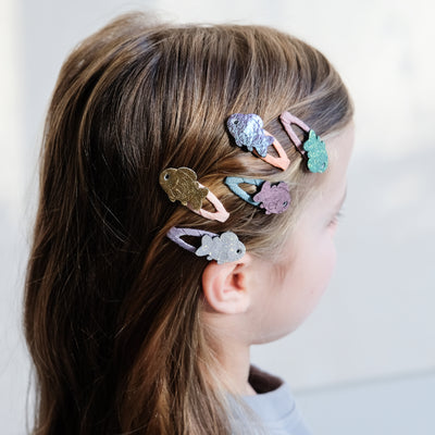 girl wearing goldfish mini clic clacs in her hair