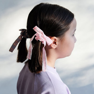 pigtail hair style with summer stripe bow scrunchies