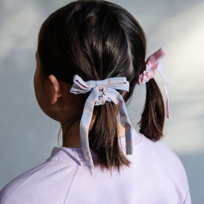 pigtail hair style with summer stripe bow scrunchies