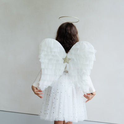 Video of young girl wearing Angel long tutu, angel wings, and angel halo