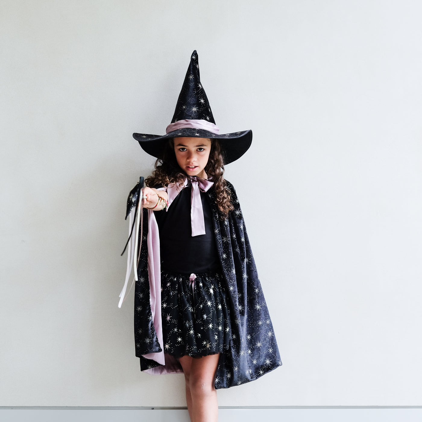 Video of a young girl wearing our Agatha black velvet witch costume