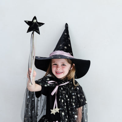 video of young girl wearing agatha black tulle witch costume